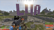a person holding a gun in front of a wall with skulls on it in a game