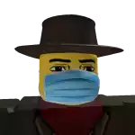 a lego cowboy wearing a hat and a mask