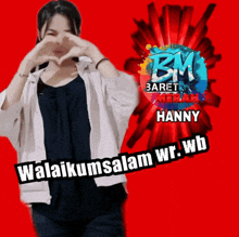 a woman making a heart shape with her hands in front of a banner that says bm baret