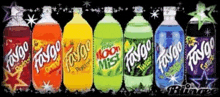 several bottles of faygo soda are lined up in a row on a black background