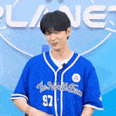 a man wearing a blue jersey with the north face on it