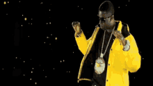 dancing gold chain rapper yellow jacket lemonade