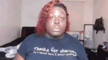 a woman wearing a t-shirt that says thanks for sharing