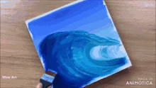 a wave is being painted on a canvas with the words wow art made in animatica
