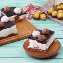 a piece of cake on a plate with a kitkat bar behind it