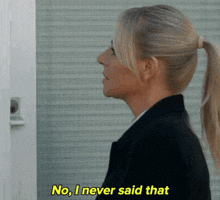a woman says " no i never said that " in yellow