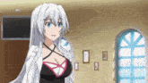 a girl with white hair and blue eyes is standing in front of a window in a room .