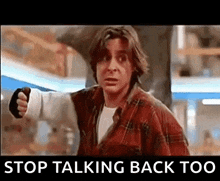 a man in a plaid shirt is pointing at the camera with the words stop talking back too below him
