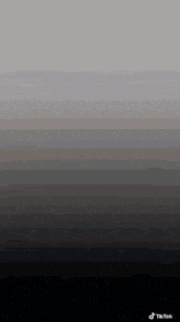 a gray background with a gradient of gray and black