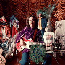 Playing The Guitar George Harrison GIF - Playing The Guitar George Harrison Ding Dong Ding Dong Song GIFs