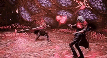 a video game character is fighting a monster with a sword .
