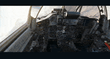 a cockpit of a fighter jet with a few buttons on it including one that says ' a ' on it