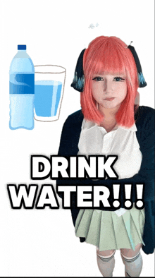 a girl with pink hair is standing in front of a glass of water and a bottle of water