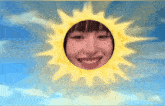 a cartoon sun with a woman 's face in the center