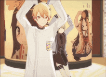 a couple of anime characters standing in front of a wall with a picture of a girl on it