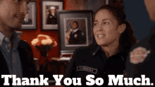 a man and a woman are standing next to each other with the words " thank you so much " above them