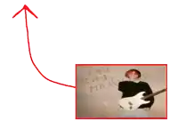 a red arrow points to a picture of a person holding a guitar in front of a wall with graffiti in russian