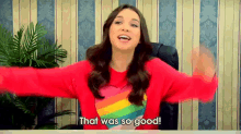 a woman wearing a red sweater with a heart on it says that was so good