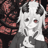 a girl with horns holding a stuffed animal