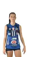 a woman wearing a blue shirt with the number 11 on it waves her hand