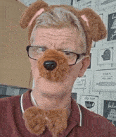 a man wearing glasses and a dog mask with a sign behind him that says they see me sip me baby