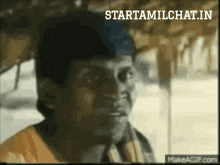 a gif of a man with the words starttamilchat.in on the bottom right
