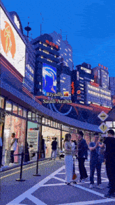 a group of people are standing in front of a building that says riyadh on it