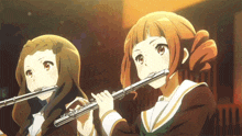 two anime girls are playing flutes in a classroom