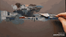 a person is painting a landscape with a spatula and the words made in animotica are on the bottom