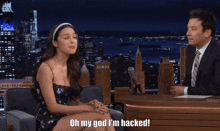 a woman sitting in front of jimmy fallon says oh my god i m hacked