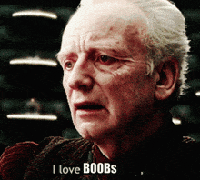 a man says i love boobs in front of a black background
