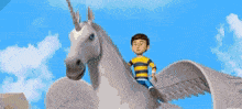 a cartoon of a boy riding a winged horse
