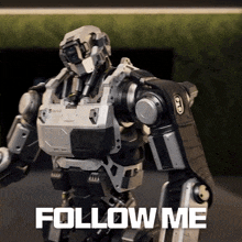 a robot that says follow me on the bottom