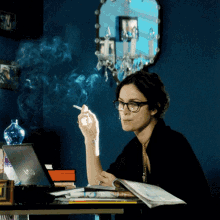 Carrie Anne Moss Smoking GIF - Carrie Anne Moss Smoking GIFs