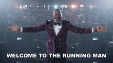 a man in a purple tuxedo is standing in front of a crowd with the words welcome to the running man written below him