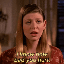 a woman says " i know how bad you hurt " in yellow letters