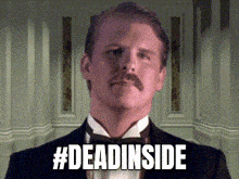 a man with a mustache wearing a tuxedo and bow tie says #deadinside .