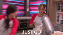 a netflix ad shows two women in a kitchen