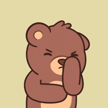 a brown teddy bear covering its mouth with its paw