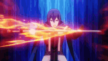 a man is holding a sword with a flame coming out of it in a video game .