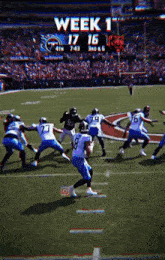 a football game is being played on a field with a score of 17 to 16 .