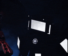 a robot with a face on it 's screen