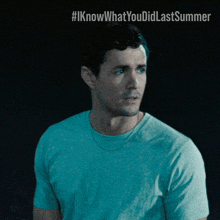 a man in a blue shirt with #iknowwhatyou didlastsummer written on the top