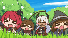 a group of cartoon characters are standing in the grass and one of them is wearing a witch hat