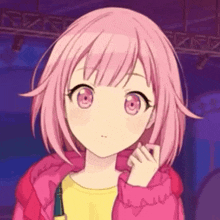 the girl is wearing a pink jacket and a yellow shirt .