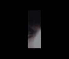 a blue letter n with a black border on a black background