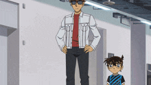 a man in a white jacket stands next to a boy in a black and blue shirt