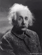 a black and white photo of albert einstein with meme-gen.ai written below him