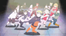 a group of naruto characters are dancing together in a dark room .