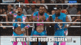 a group of wrestlers are standing in a ring with the words we will fight your children